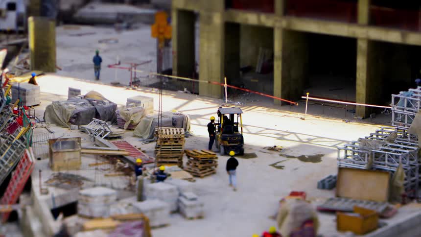 Group of workers on a large construction site