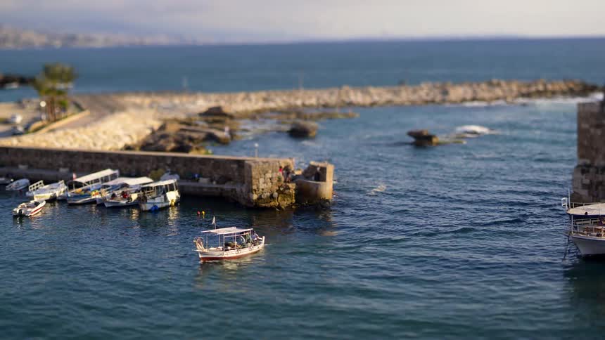 A footage of boats parked at the seashore