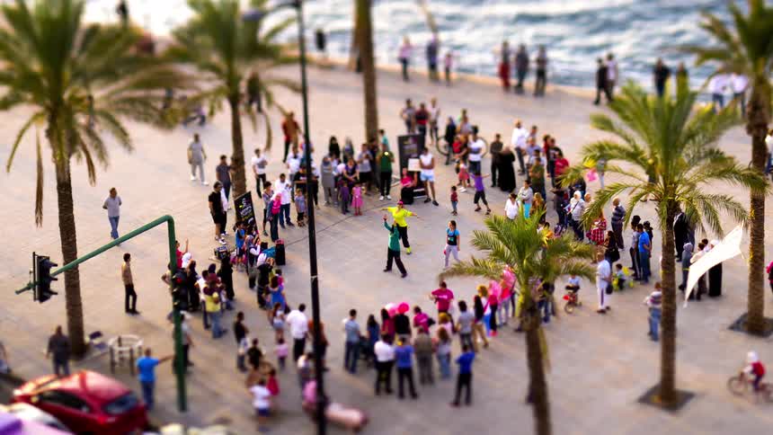 An aerial footage of people having fun at the beach side