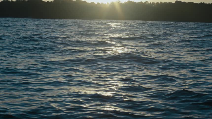 The sun is rising on the island
