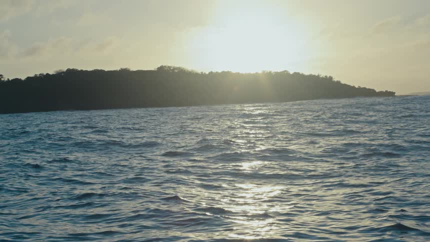 The sun is reflecting on the ocean water