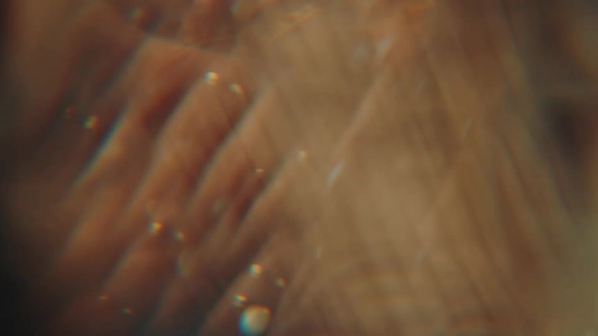 A persons hand is mirrored repeatedly