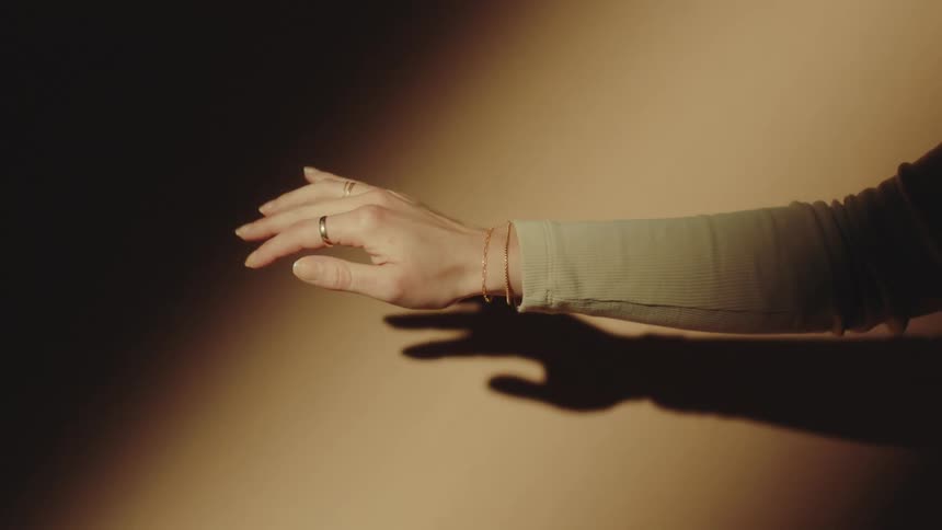 A footage of a person rubbing his or her palm