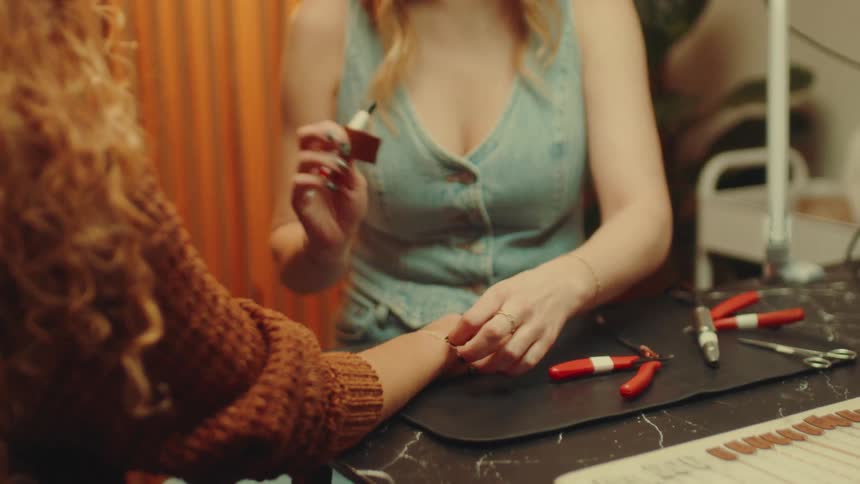 A footage of a ladies having a conversation in a workshop