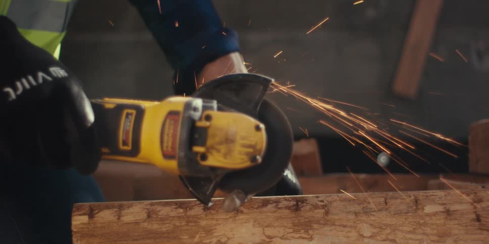 Civil engineer using an iron cutting tool in operation