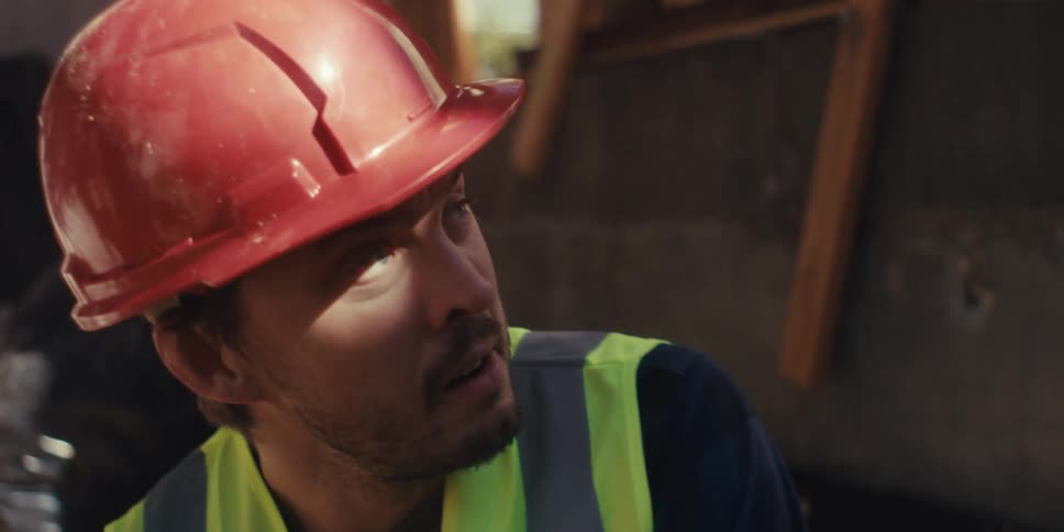 A footage of a worker holding a wood