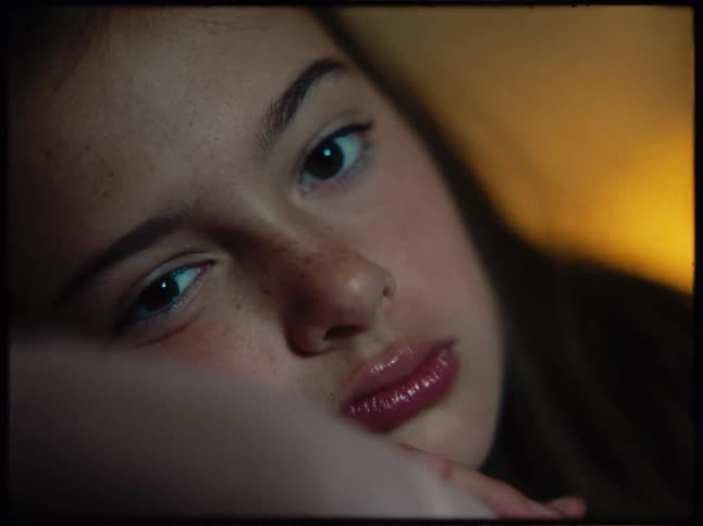 A girl is laying down