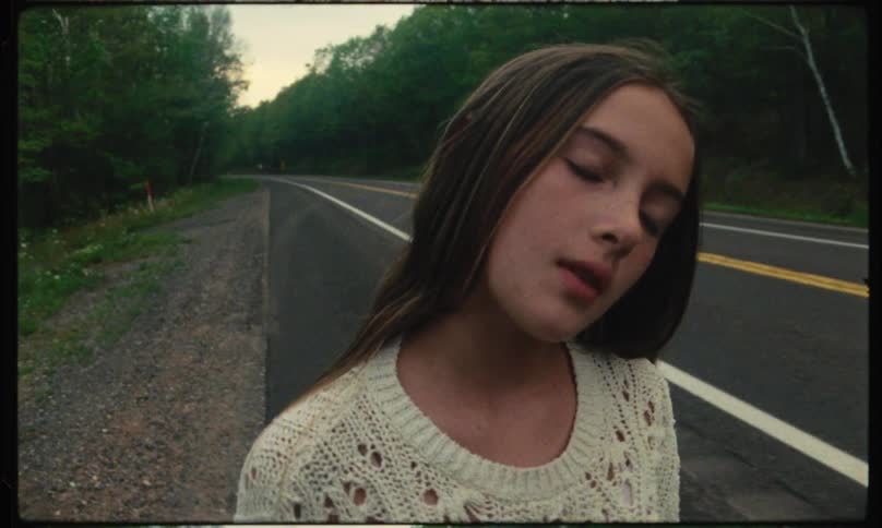 A footage of a girl walking on the expressway