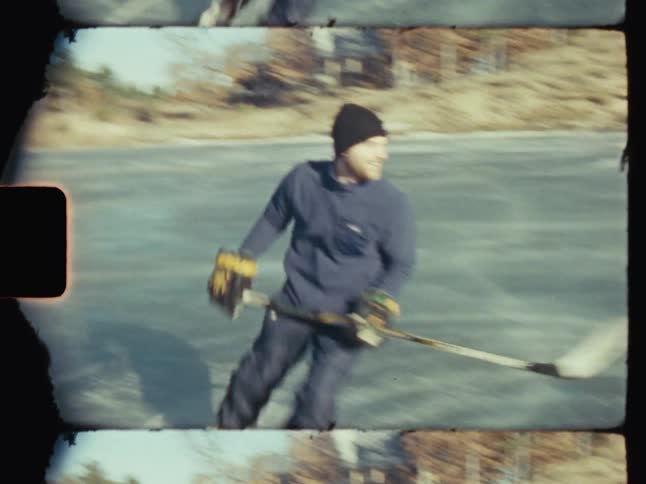 A man skates around the hockey net on the ice