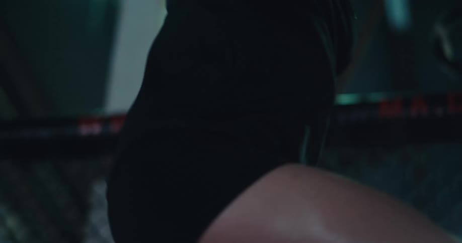 Person raising legs and warming up indoors