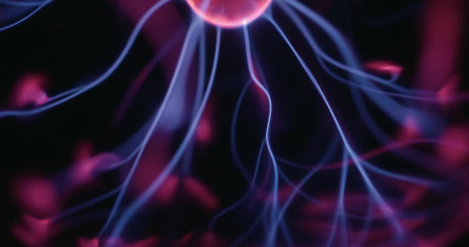 Nucleus emitting magnetic waves in neon blue and violet colors