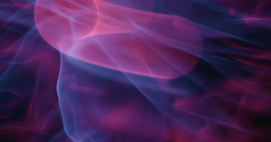 A plasma ball displays extreme chaotic movement as swirling arcs of neon color twist and morph across its surface each luminous ribbon flickering against a dark backdrop