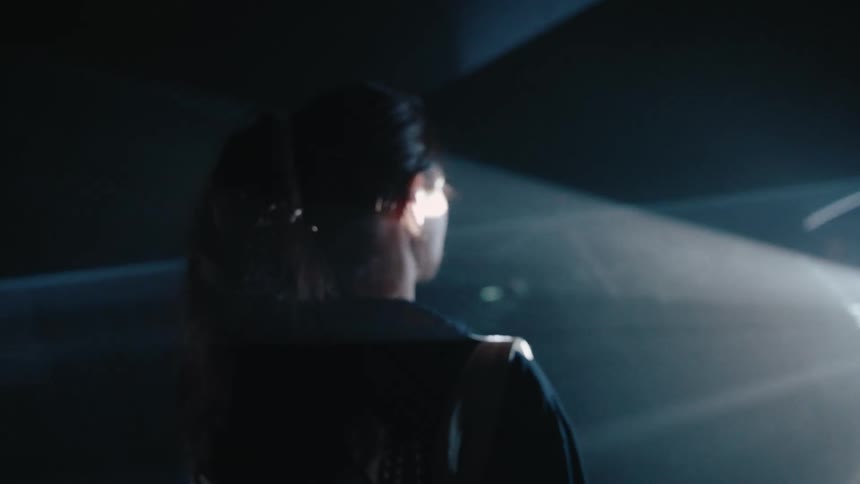 Silhouette of a womans face in a studio setting