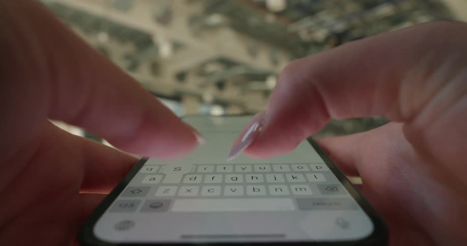A person is texting on their cell phone