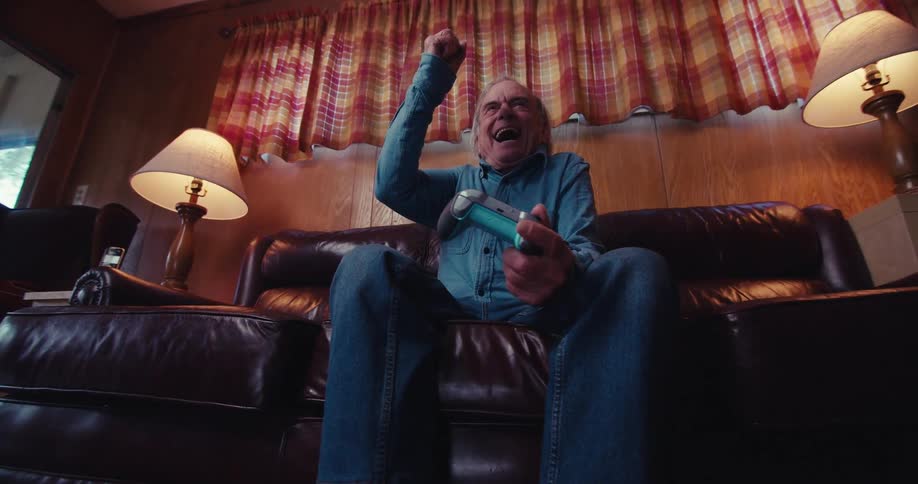 A footage of an elderly man playing game