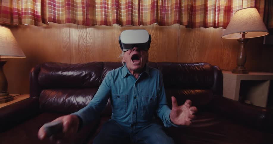 A footage of an elderly man playing virtual reality