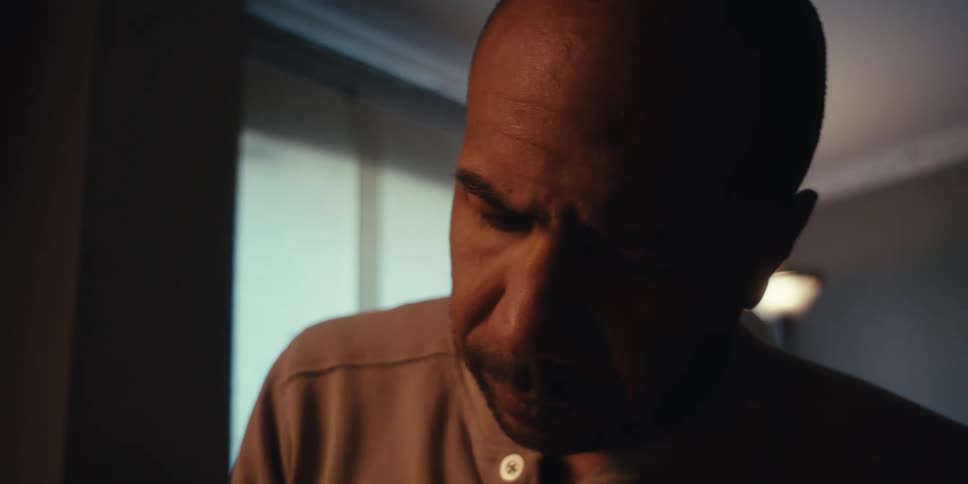 Man in an indoor space in a room