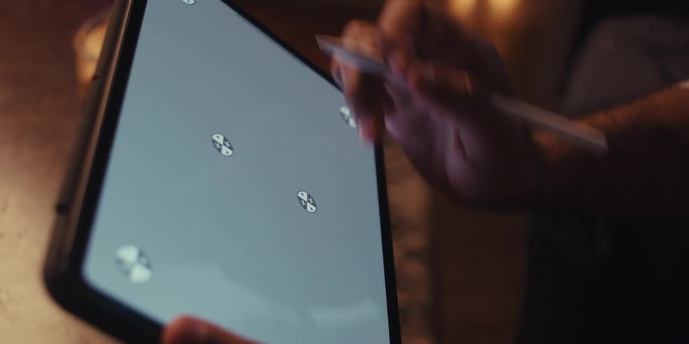 Fingers on a tablet scrolling