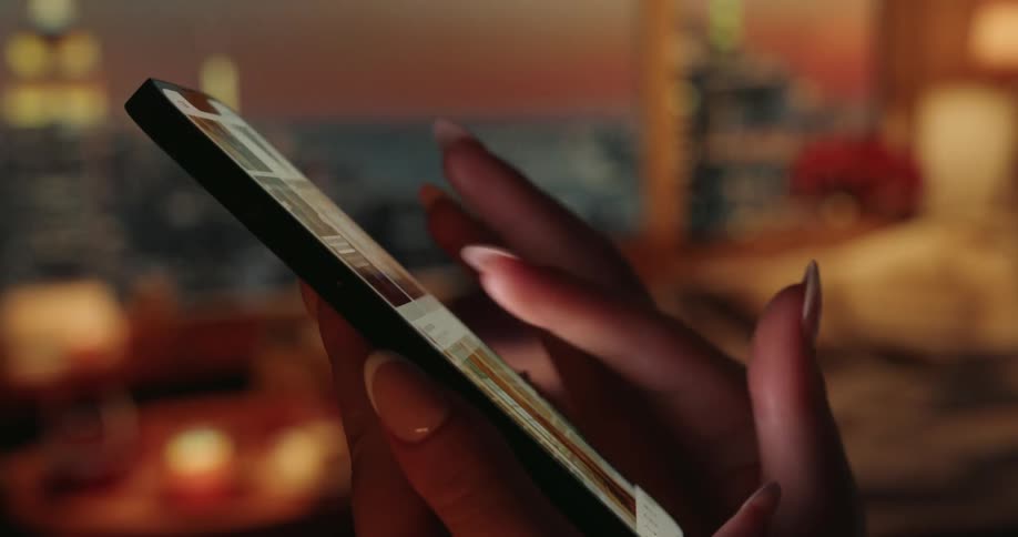 A person scrolling on their phone