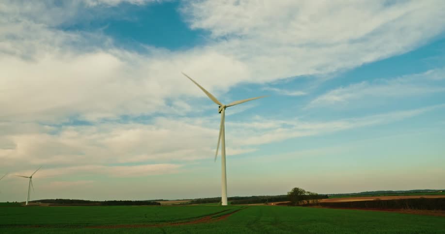 Agricultural field with wind turbines