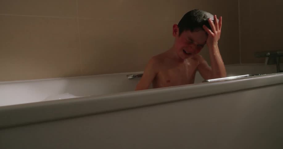 Child taking a bath in the bathtub