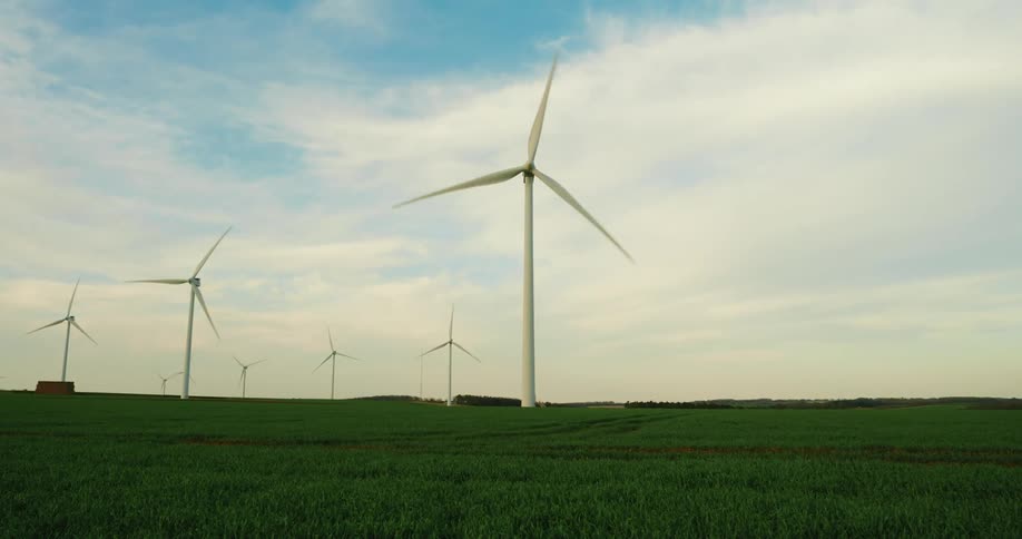 Wind turbines generating energy on a wind farm