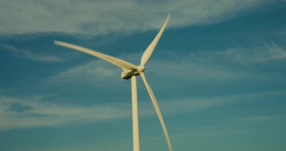 The windmill is turning in the sky