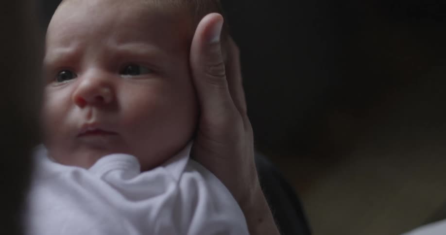 A person holding a baby