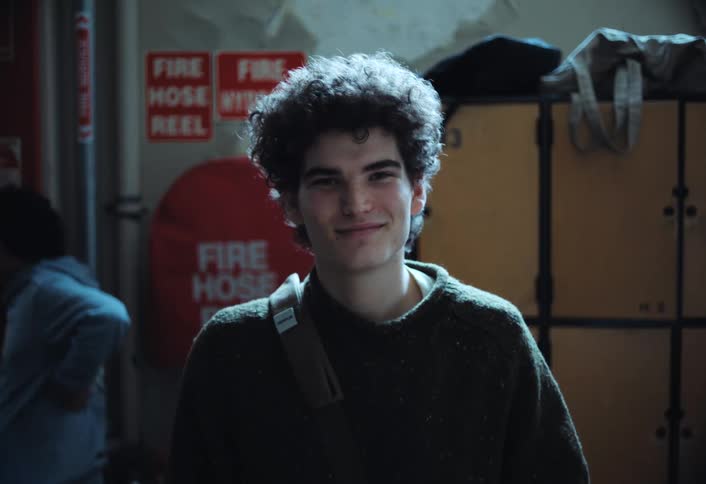 A footage of a male smiling