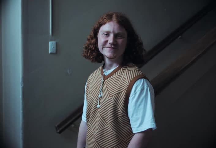 A footage of a male posing for a picture