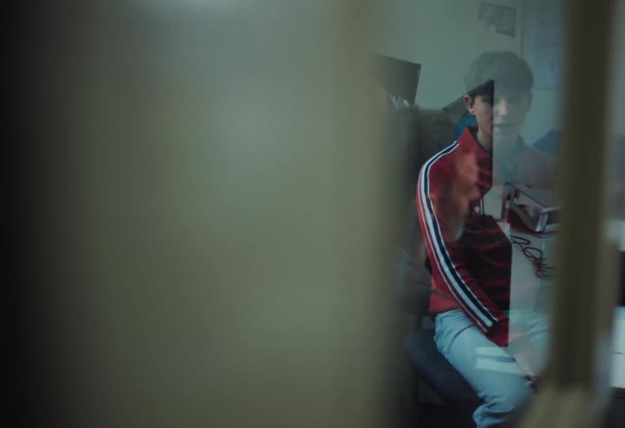 A footage of a person sitting