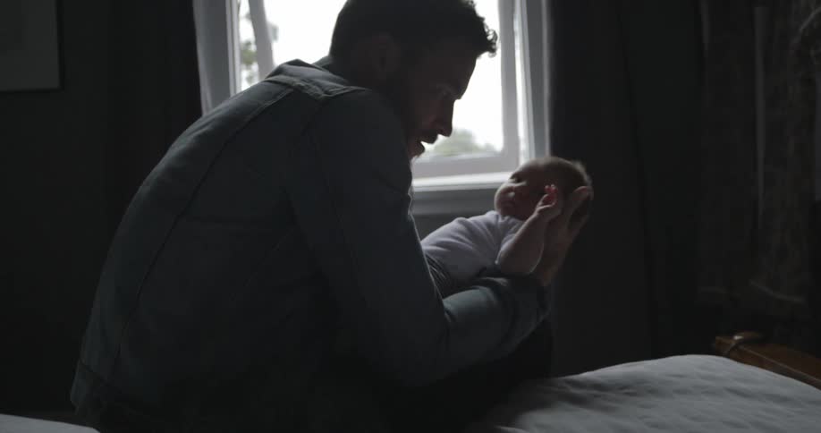 A person holding a baby