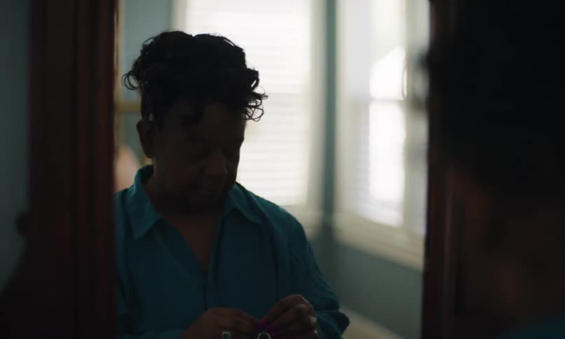 A footage of a person wearing an earring