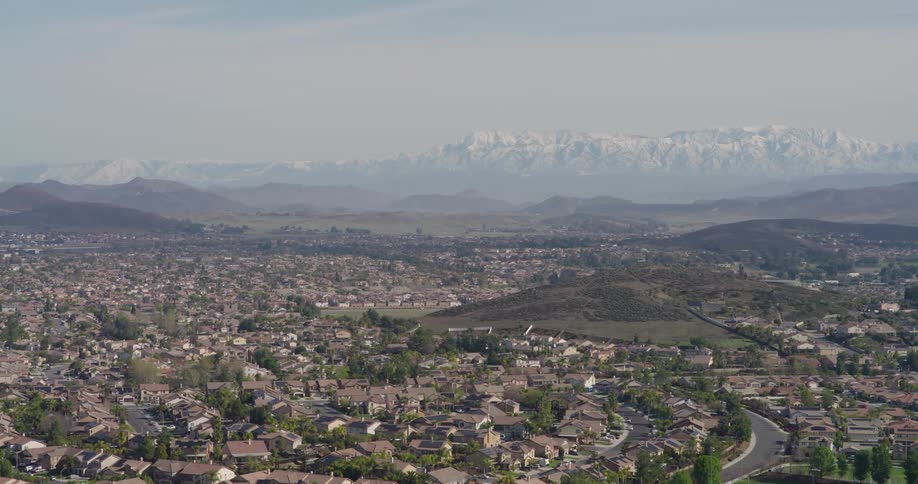 The suburbs are near the mountains