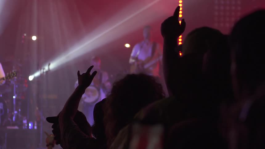 The crowd is enjoying the music at the concert