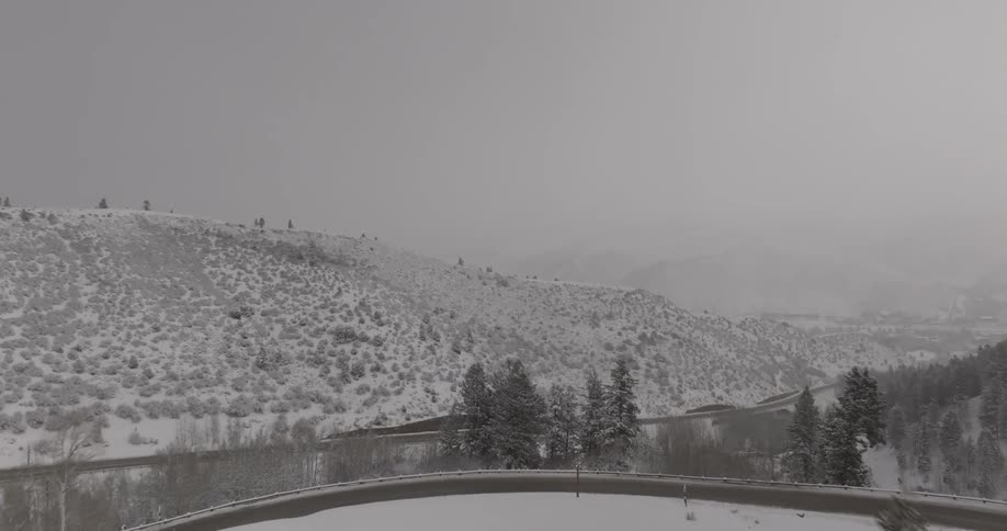An aerial clip of a mountainous area during winter