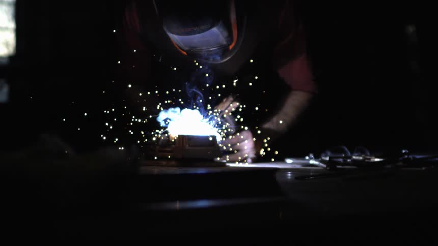 Man working and welding