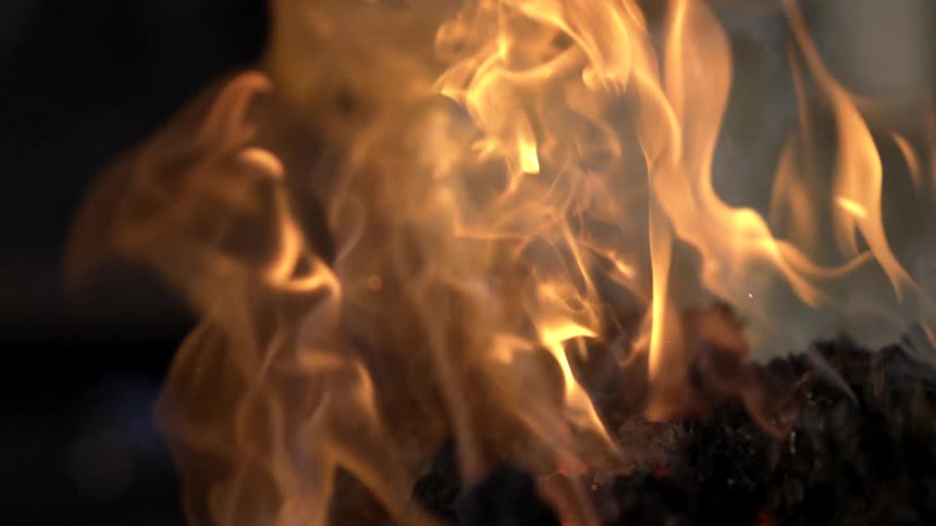 Flames rise into the air