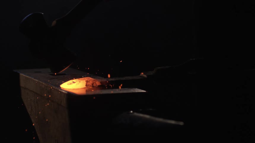 Iron wrought and forged by someone with a hammer