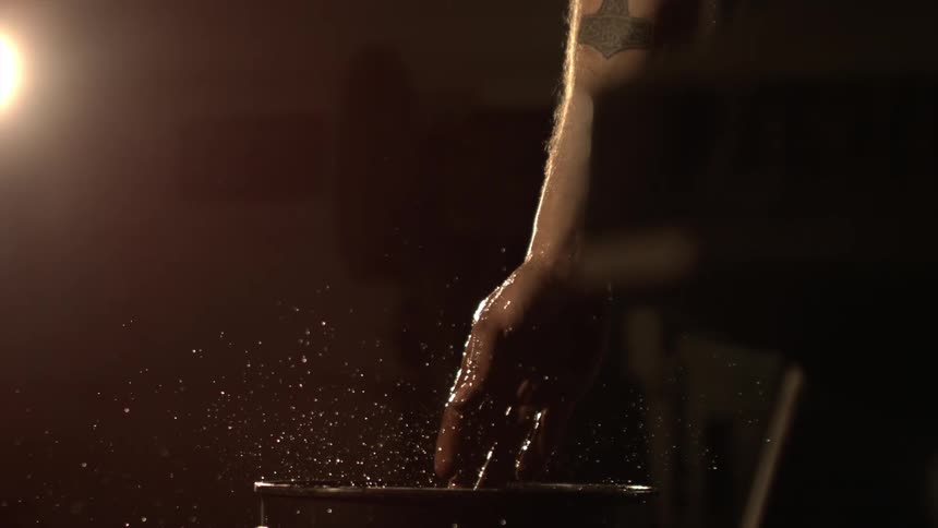Hand splashing water