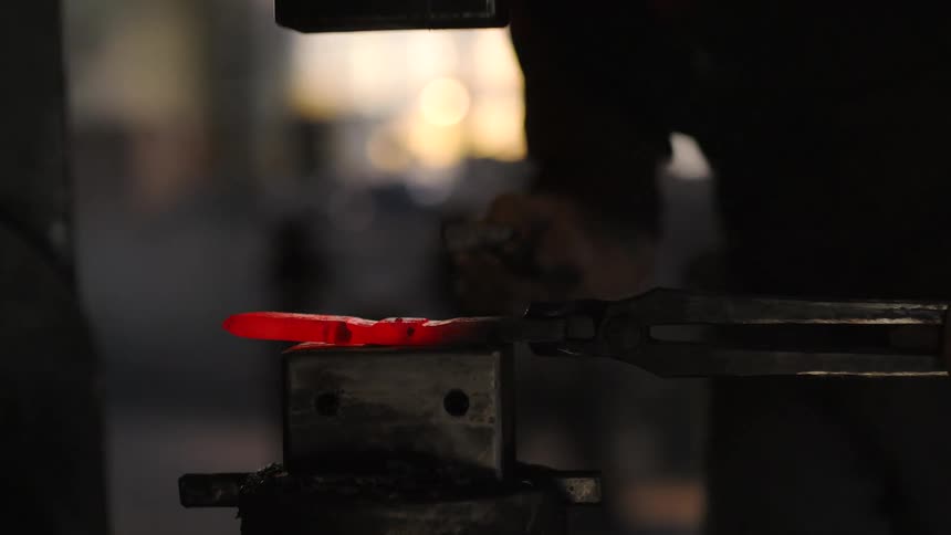 A footage of an iron forge process