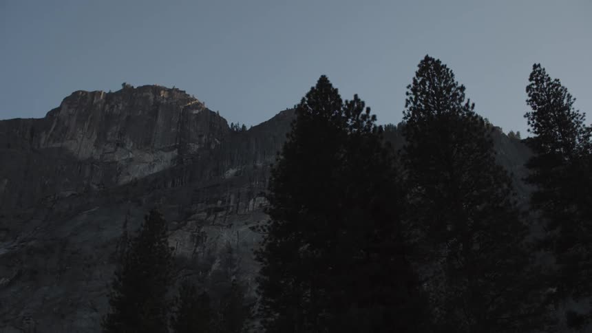 View of mountains and trees on an overcast day