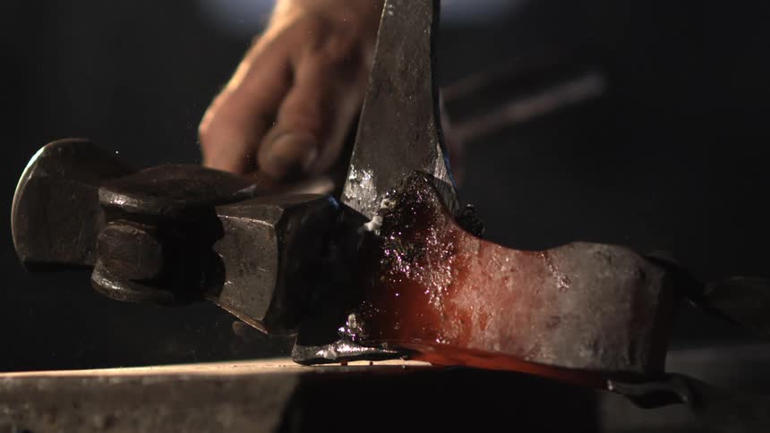 Person who bangs iron with a hammer to work it