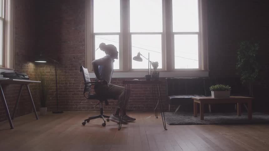Guy who sits in his office and starts working on his computer