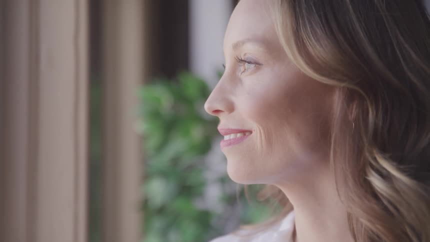 A close up footage of a lady smiling