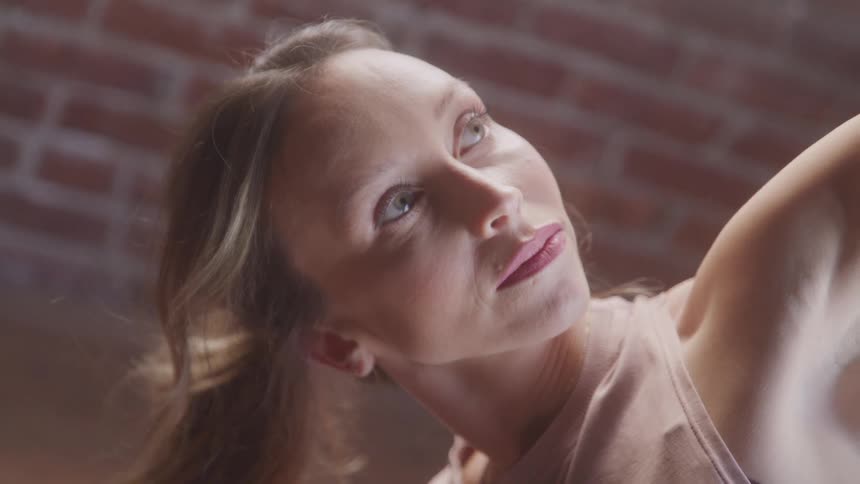 Girl looking up in a strange position
