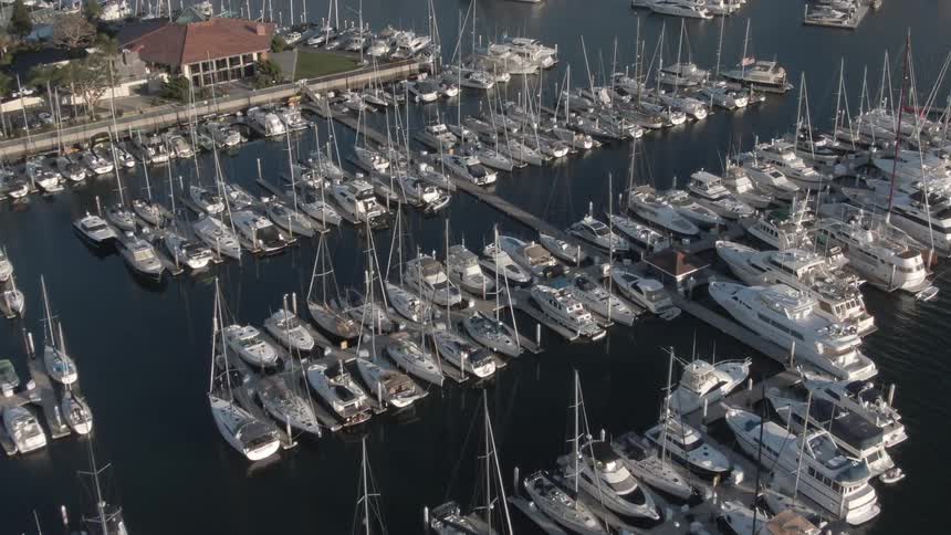 View of a harbor with many boats docked