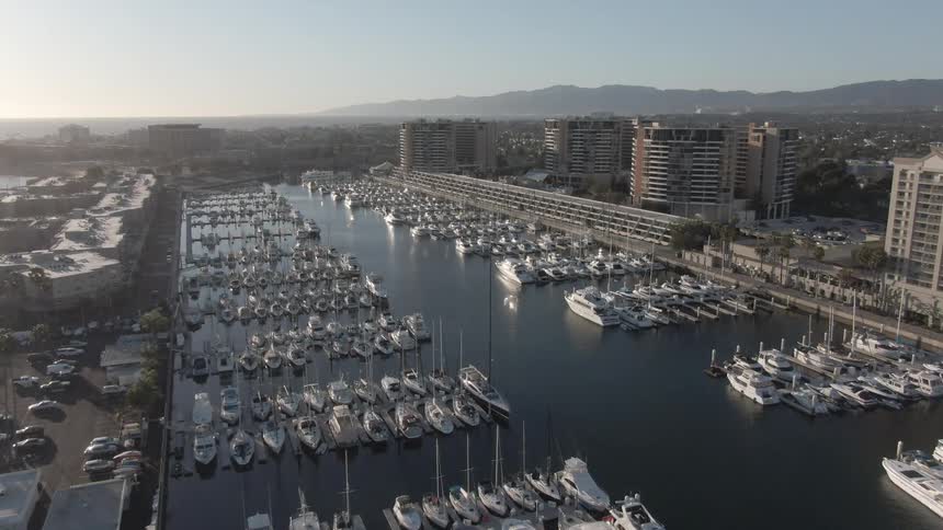 View of a harbor with many docked boats