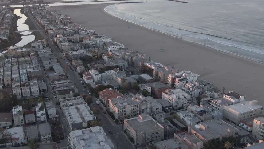 Coastal landscape on a town with many buildings and the sea