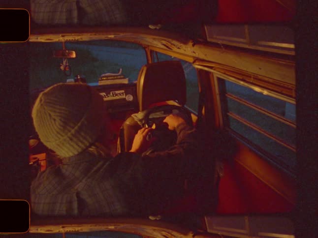 A footage of a person in a van